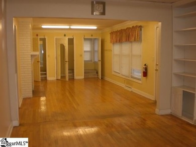 Desirable location just off Wade Hampton Boulevard suitable for