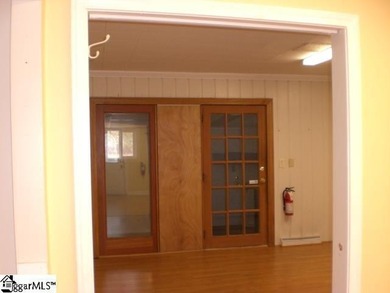 Desirable location just off Wade Hampton Boulevard suitable for