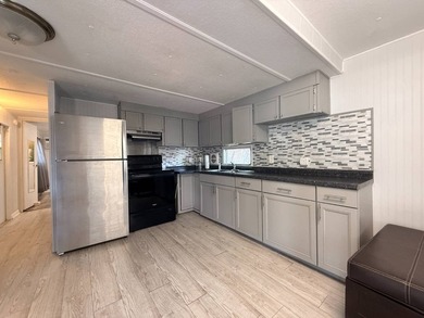 1 bedroom, 1 bath with updates. Carport. Great location off of - photo 5