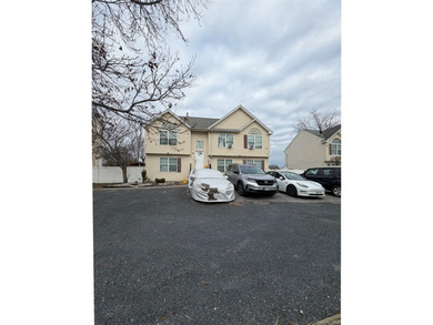 Welcome to this massive 7 Bedroom, 5 Bath oversized high ranch - photo 1
