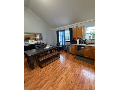 Welcome to this massive 7 Bedroom, 5 Bath oversized high ranch - photo 6