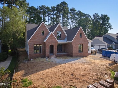 Crafted by Wagoner Homes, this extraordinary 5,032-square-foot - photo 2