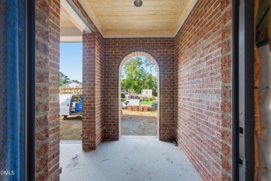 Crafted by Wagoner Homes, this extraordinary 5,032-square-foot - photo 3