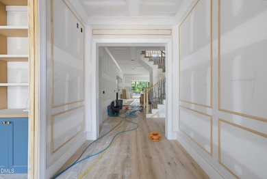 Crafted by Wagoner Homes, this extraordinary 5,032-square-foot - photo 4