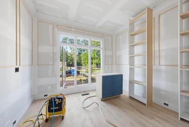Crafted by Wagoner Homes, this extraordinary 5,032-square-foot - photo 5