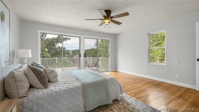 Lakefront living at its finest! This updated 4-bedroom, 3-bath - photo 16