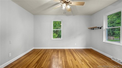 Lakefront living at its finest! This updated 4-bedroom, 3-bath - photo 18