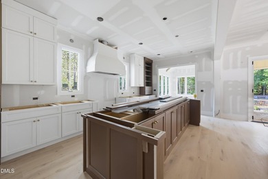 Crafted by Wagoner Homes, this extraordinary 5,032-square-foot - photo 8