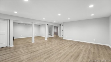 Lakefront living at its finest! This updated 4-bedroom, 3-bath - photo 24
