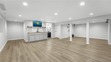 Lakefront living at its finest! This updated 4-bedroom, 3-bath - photo 27