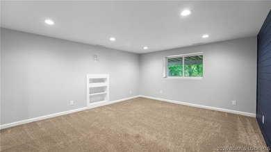 Lakefront living at its finest! This updated 4-bedroom, 3-bath - photo 28