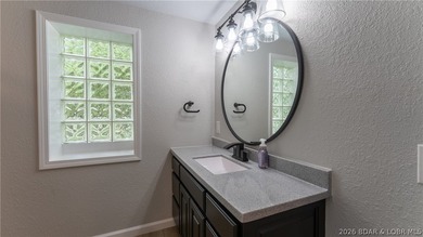 Lakefront living at its finest! This updated 4-bedroom, 3-bath - photo 34