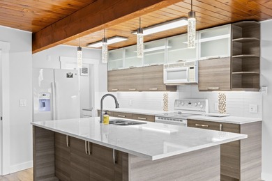 Lakeshore life meets incredible value in this turnkey townhome - photo 6