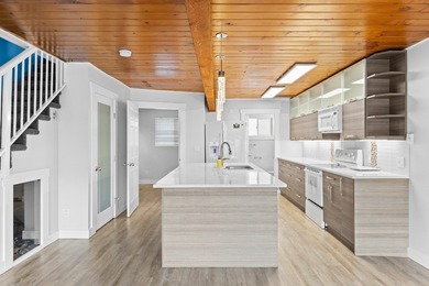 Lakeshore life meets incredible value in this turnkey townhome - photo 7