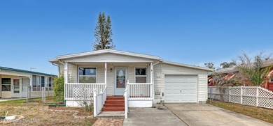This Charming 2-bedroom, 2-bath manufactured home in the 55+ - photo 1