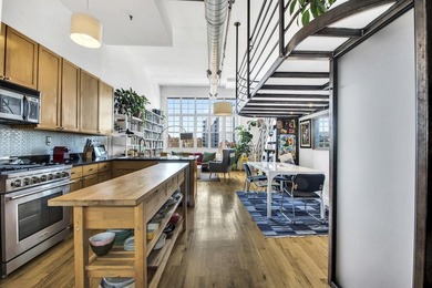 ARCHITECTURAL DUPLEX LOFT AT THE CHOCOLATE FACTORY A truly - photo 1