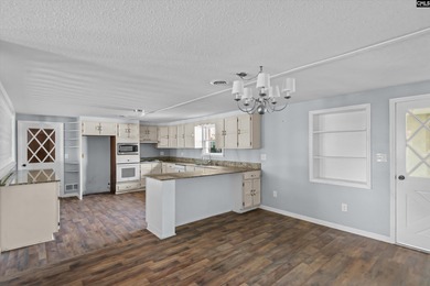 Enjoy peaceful country living on 2.07 private acres at 336 Muddy