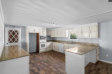 Enjoy peaceful country living on 2.07 private acres at 336 Muddy