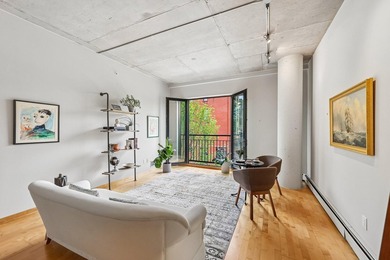 Welcome to 212 Lofts, where city living feels open, bright, and - photo 4