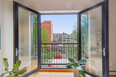 Welcome to 212 Lofts, where city living feels open, bright, and - photo 5