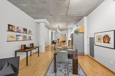 Welcome to 212 Lofts, where city living feels open, bright, and - photo 8