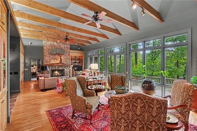 From the moment you step inside, soaring vaulted ceilings and a - photo 10
