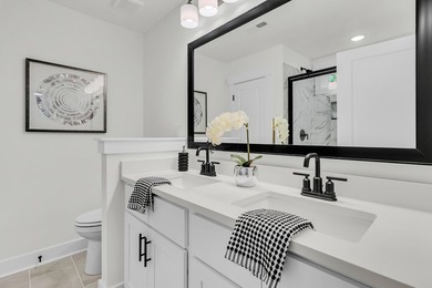 Located on a beautiful homesite of over a quarter acre in the - photo 18