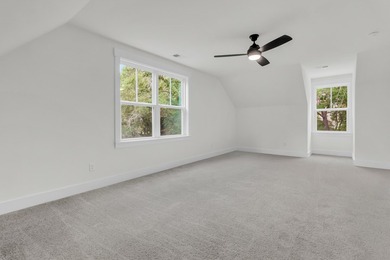 Located on a beautiful homesite of over a quarter acre in the - photo 20