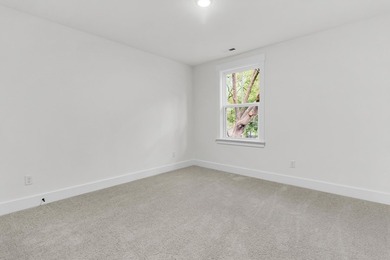 Located on a beautiful homesite of over a quarter acre in the - photo 22