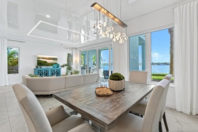 Move-in ready, this waterfront corner villa offers VIEWS - photo 11