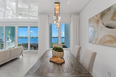Move-in ready, this waterfront corner villa offers VIEWS - photo 12