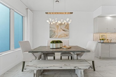 Move-in ready, this waterfront corner villa offers VIEWS - photo 13