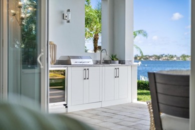 Move-in ready, this waterfront corner villa offers VIEWS - photo 15