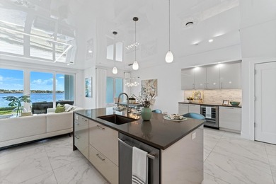 Move-in ready, this waterfront corner villa offers VIEWS - photo 22