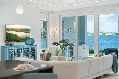 Move-in ready, this waterfront corner villa offers VIEWS - photo 25