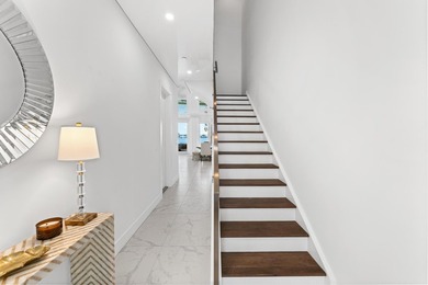 Move-in ready, this waterfront corner villa offers VIEWS - photo 28