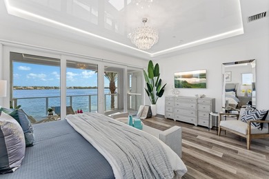 Move-in ready, this waterfront corner villa offers VIEWS - photo 32