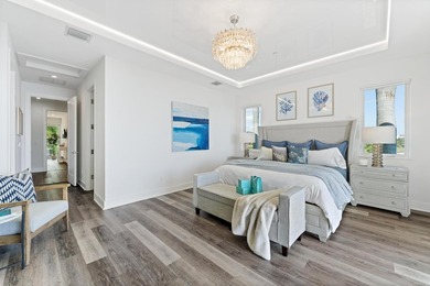 Move-in ready, this waterfront corner villa offers VIEWS - photo 34