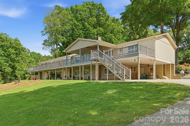 Enjoy the best of lake living in this beautifully designed - photo 1