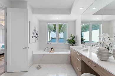 Move-in ready, this waterfront corner villa offers VIEWS - photo 41