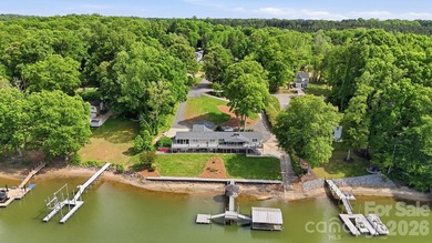 Enjoy the best of lake living in this beautifully designed - photo 2