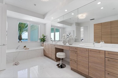 Move-in ready, this waterfront corner villa offers VIEWS - photo 42
