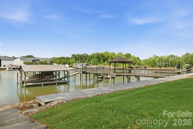Enjoy the best of lake living in this beautifully designed - photo 3