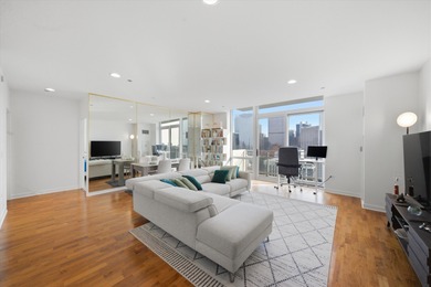 Perched on the 27th floor, this expansive one-bedroom, one-bath