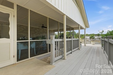 Enjoy the best of lake living in this beautifully designed - photo 6