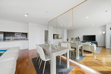 Perched on the 27th floor, this expansive one-bedroom, one-bath