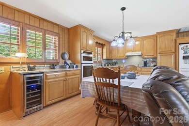 Enjoy the best of lake living in this beautifully designed - photo 10