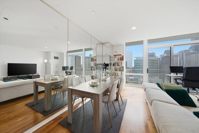 Perched on the 27th floor, this expansive one-bedroom, one-bath