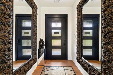 Experience elevated golf course living in this exceptional - photo 2