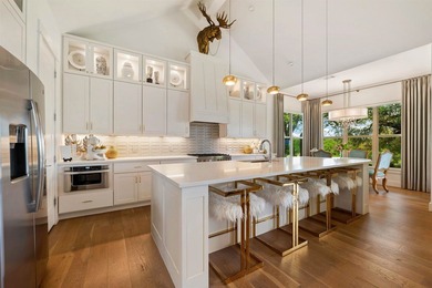 Experience elevated golf course living in this exceptional - photo 10